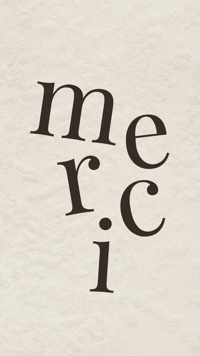 Modern French “Merci” thank you card featuring elegant staggered serif typography on textured background.